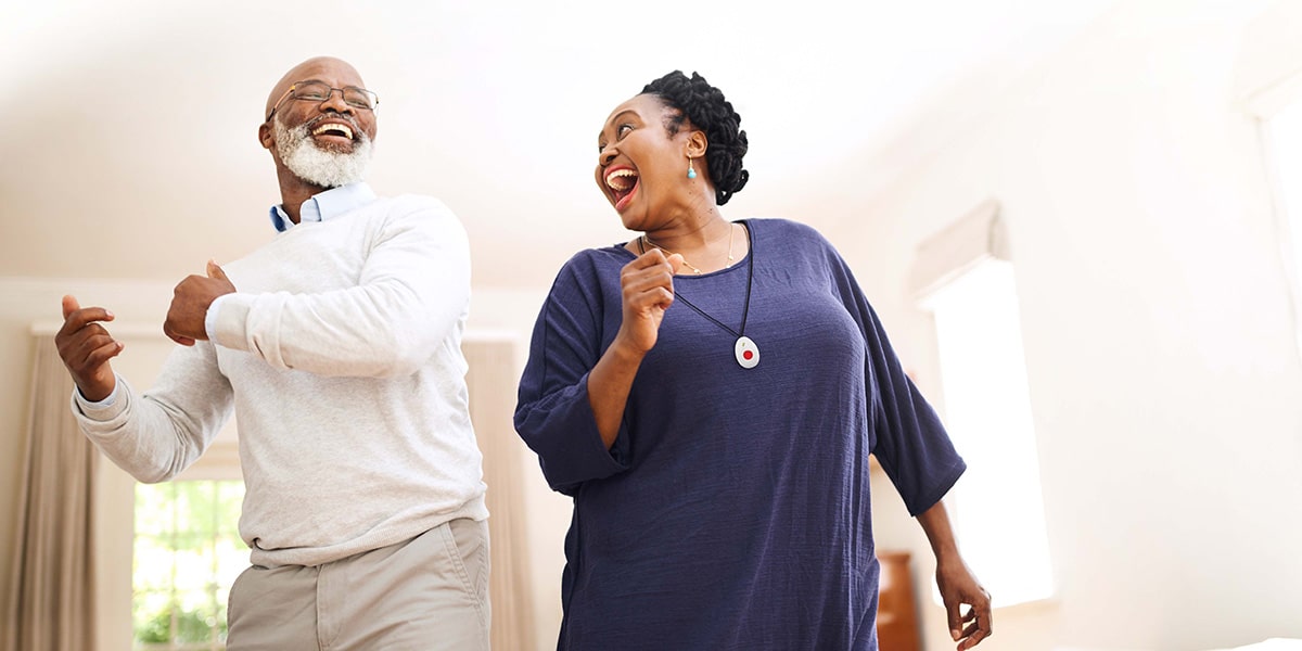 elderly couple dancing